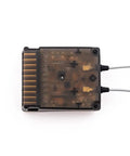 Top view of FTR12B 2.4GHz 12CH AFHDS 3 dual antenna receiver showing transparent casing and multiple connection ports.