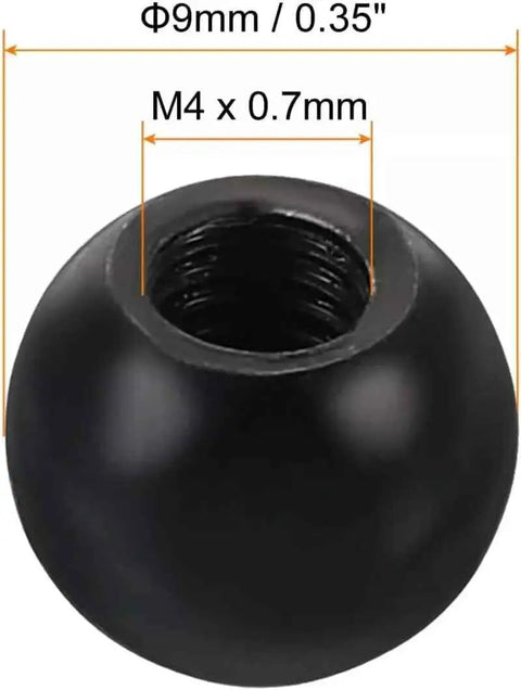 Close-up of single black steel ball style M4 thread cap nut, 9mm diameter, black finish for light fixtures and furniture.