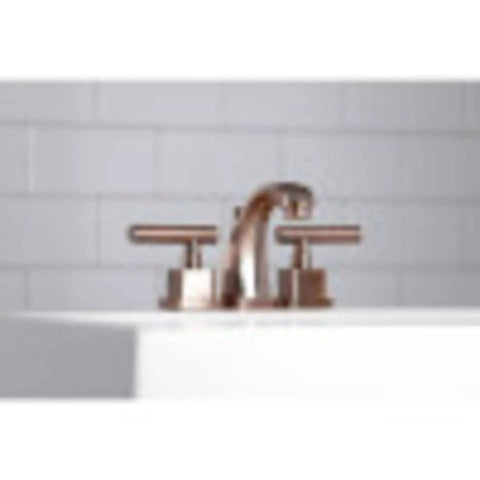 Claremont Mini Widespread Lavatory Faucet With Brass Pop Up Drain Polished Brass Finish adjustable 4-8 Inch center view on sink.