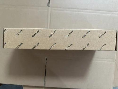 Front view of brown cardboard box with repeating KRETLAW branding for grease gun kit