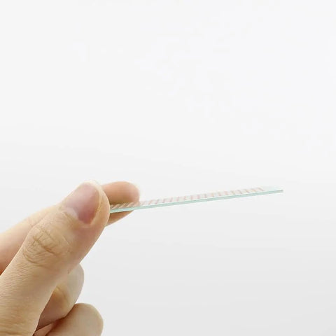 Side view of Copper Stripboard Prototyping Board 50mm By 70mm Single Sided 368 Holes, showing thin fiberglass base.