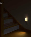 8 Pack Plug In Kid Friendly Night Light With Dusk To Dawn Sensor 2700K Warm White LED Nightlight illuminating stairs