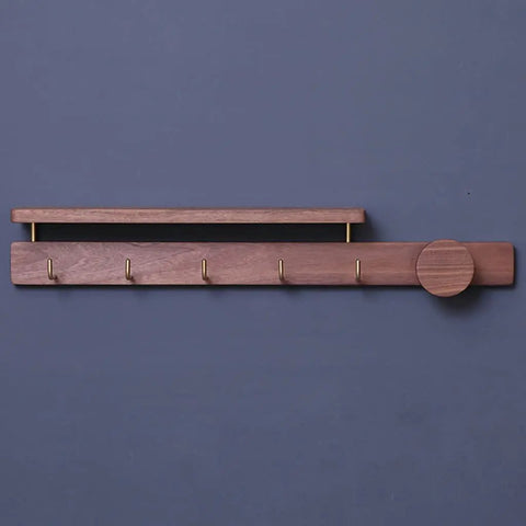 Badass Wall Mounted Coat Rack and Multi Slot Key Hook Solid Wood Construction with Brass Hooks to Hang Coats Jackets Handbags Hats Umbrellas Heavy Duty Build Sweet Entryway Decor on grey wall.