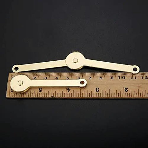 Two Pieces Metal Lid Support Hinges For Cabinets And Wood Boxes, 68x8mm, golden and durable, shown next to a ruler for size reference.