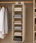 6 Shelf Hanging Closet Organizer With Durable Canvas Storage For Shoes Clothes And Accessories Beige Wardrobe Shelving To Max Out Your Closet Real Estate And Keep Your Setup Clean And Tight, holding neatly folded clothes.