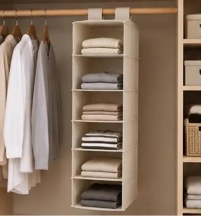 6 Shelf Hanging Closet Organizer With Durable Canvas Storage For Shoes Clothes And Accessories Beige Wardrobe Shelving To Max Out Your Closet Real Estate And Keep Your Setup Clean And Tight, holding neatly folded clothes.