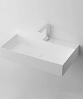 HAOCHRYSYPH Wall Mount Sink, Solid Surface, Matte White, 36 x 18 in. Top view of rectangular sink with modern faucet.