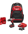 M18 Straight Shooter 18V Cordless Compact Drill Driver Kit With Premium Lithium Ion Battery 1/2 Inch Keyless Chuck 15 Piece Screwdriver Bit Set And Workhorse Bag displayed with charger and battery in a backpack.