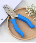 Blue One Circle Hole Punch With Soft Grip Handheld Paper Punch for crafts on wooden tray