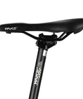 Alloy Bike Seatpost 27.2 X 400mm with Four Size Shim Spacers attached to a bicycle saddle, side view