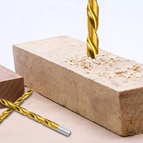ENERTWIST titanium-coated drill bit drilling into a light brick block on a wooden surface