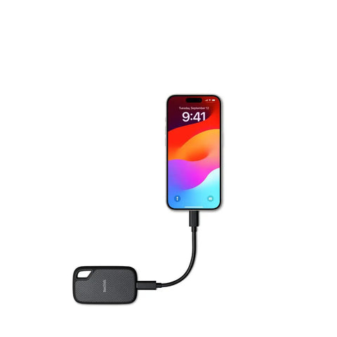 2TB Extreme Portable SSD connected to iPhone showing external solid state drive for crazy fast transfers and backups on Apple devices.