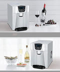 Portable Countertop Ice Maker with Water Dispenser Silver Automatic Unit Generates 33lbs Fast Ice 24 Hrs on kitchen countertop.