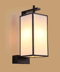 Knockout Indoor Rectangular Wall Light Featuring Handmade Linen Shade And Corrosion Resistant Iron Body Giving Your Bedroom Bedside Setup A Super Cool Modern Chinese Vibe Today, with a soft glowing light.