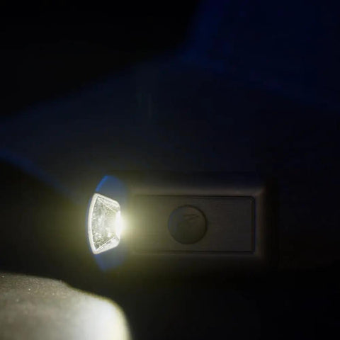 Close-up of PowerCap Hat Clip On Lamp Rechargeable LED Headlamp Hands Free Ultra Bright With 3 Lighting Modes in use