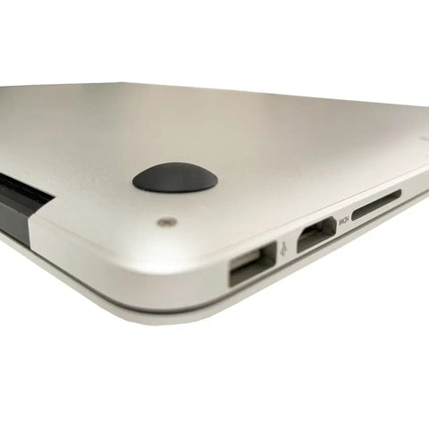 Side view of laptop with installed self adhesive rubber feet pads replacement bottom feet for laptops MacBook Pro MacBook Air and more