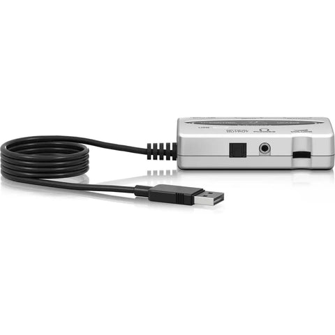 Side view of UCA202 Ultra Low Latency USB Audio Interface With 2 In 2 Out Digital Output for PC and Mac showing USB cable and ports.