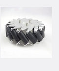 Front view of a 6-inch Mecanum wheel with ball bearings and angled black rollers around a metal hub.