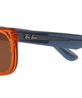 Wayfarer Reverse Sunglasses With Transparent Orange And Dark Grey Mirrored Copper Lenses 53 mm side view on white background