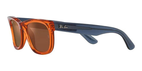 Wayfarer Reverse Sunglasses With Transparent Orange And Dark Grey Mirrored Copper Lenses 53 mm side view on white background