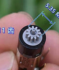 Close-up of micro planetary gearbox with 5.35mm diameter, 11-tooth gear for DIY robots. Micro Planetary Gearbox DC Motor For DIY Robots High Torque.