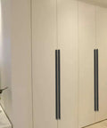 Beefy Aluminum Cabinet Handle Set 1000mm Length Black Edge Pulls For Kitchen Cabinets And Drawers installed on white cupboards