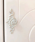Four Pack 102mm Vintage Rose Cabinet Knobs With Backplates Zinc Alloy Flower Drawer Pulls For Dresser Vanity Nightstand Cupboard Ivory White And Gold Edge Finish Easy One Hole Install installed on white cabinet