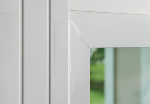 Transparent Weather Sealing Tape 1.5 in x 30 ft (Crystal Clear) Removable Insulation Tape on interior window frame.