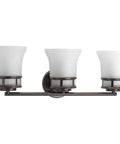 3 Light Coastal Style Bathroom Vanity Light With Dope Etched White Glass Shades Reversible Mounting Antique Bronze Finish Cascadia Collection