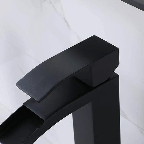 Close-up of Dope Sleek Black Vessel Sink Faucet With Waterfall Spout And Single Handle, Tall Vanity Faucet