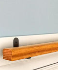 Heavy Hitter Wall Mounted Stair Railing Set With Rock Solid Non Slip Banister Design And Smooth Grip For Top Tier Indoor Outdoor Safety On Balconies Stairs And Porches, wooden handrail close-up.