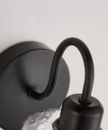 Close-up of Set Of 2 Black Farmhouse Vanity Wall Lights With Seeded Glass Shades Sleek Modern Metal Sconce Fixtures E26 Base