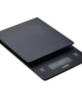 V60 Drip Scale Black For Precision Pour Overs With Zero Point One Gram Increments displayed at an angle