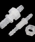 Front view: two translucent plastic 3/8-inch hose barb thru-bulkhead union adapters with stainless steel washers.
