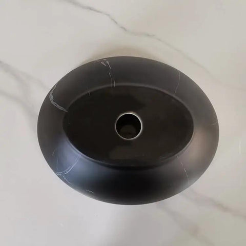 Top view of USZWBY Vessel Sinks Bathroom Vessel Sink Creative Balcony Art Wash Basin ceramic black washbasin with center drain.