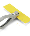 Heavy Duty One Eighth Inch Circle Craft Punch for cardstock, chipboard and lightweight metal with locking handle on yellow paper