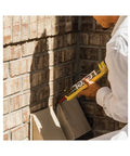 Person applying Lexel Clear Sealant 5-Ounce Co-Polymer Rubber Adhesive Caulk That Paints No Mess Scrubbable And Durable Sticks To Wet Surfaces Ultra Clear for sealing brick corner outdoors