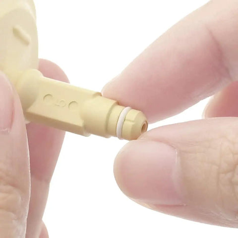 Replacement O Ring Kit With Two Membranes For Harmony Manual Breast Pump BPA Free FDA Registered Medical Device Easy Replacement To Restore Suction And Pump Performance, close-up O-ring on beige pump part
