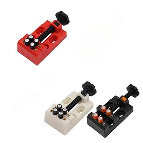 Three colored Heavy Duty Table Vise Mounting Fixtures for Woodworking and Carving with screw knobs and clamps for various shapes.