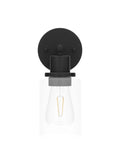 Black wall sconce with clear glass shade, 1-light design, matte black finish, E26 socket, bulbs not included, front view.