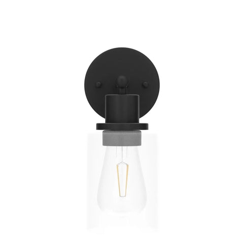 Black wall sconce with clear glass shade, 1-light design, matte black finish, E26 socket, bulbs not included, front view.