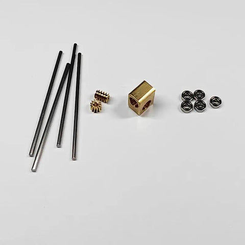 Hella Reliable Micro Worm Gearbox With One Damn Fine 12 To 1 Reduction Ratio And Clean 90 Degree Output Shaft Layout For Quick Robot Builds and Frictionless Assembly showing components including black rods and brass fittings.