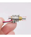 Close-up of 5V To 6V Precision Stepper Starter Motor For Telescopic Linear Actuator With 10mm Shaft And 6mm Stroke Electronic Driver Kit.
