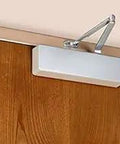 Tri Style Heavy Duty Door Closer For Commercial Use, Non-Handed, Cast Aluminum, mounted on wood door in top jamb position