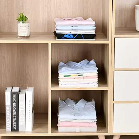 Slick Setup Folding Clothes Organizer Set For Quick T Shirt Folder Board With Stackable Clothing Dividers in a wooden shelf, neatly folded shirts.