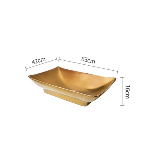 Next Level Golden Ceramic Vessel Sink For Above Counter Bathroom Vanity, 63x42x16 cm sleek gold basin side view.