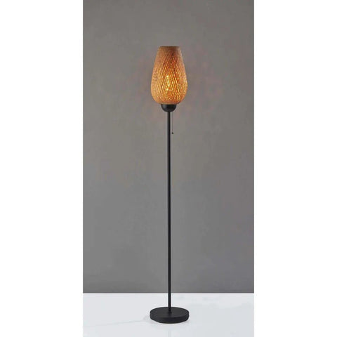 Hugo Table Lantern With Natural Bamboo Shade And Black Metal Finish, creating cozy glow, tall narrow design, off-white background.