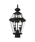 Black outdoor post head with two lights, clear beveled glass, seen isolated, similar style to Georgetown 2-Light Outdoor Post Head In Polished Brass With Clear Beveled Glass, Weatherproof Exterior Light Fixture For Porch, Deck, Pathway, Or Garden, Old-School Brass Finish, Easy Post Mount.