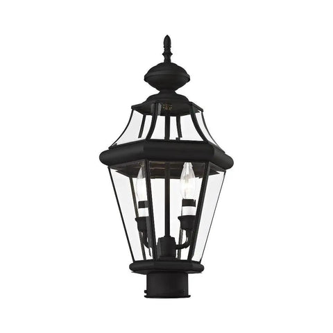 Black outdoor post head with two lights, clear beveled glass, seen isolated, similar style to Georgetown 2-Light Outdoor Post Head In Polished Brass With Clear Beveled Glass, Weatherproof Exterior Light Fixture For Porch, Deck, Pathway, Or Garden, Old-School Brass Finish, Easy Post Mount.
