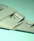 One Hundred Forty Four Scale Boeing 777 300 Landing Flaps Resin Aircraft Accessory Kit in grey, showing flap detail.